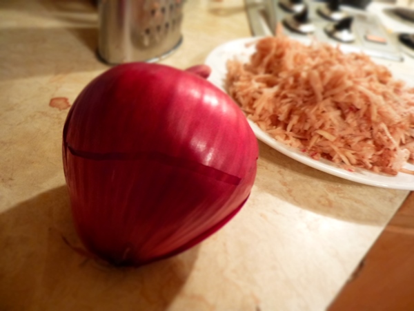 I like the flavor of onion with my hashbrowns, so I used about a 1/4 of a large red onion. 
